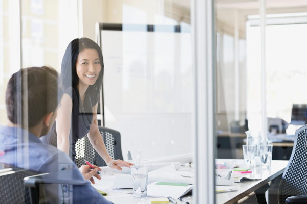 asian-woman-smiling-at-business